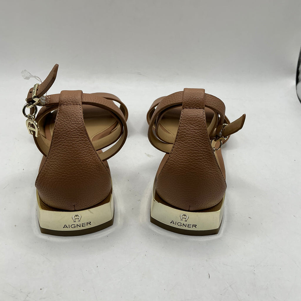 Aigner, low heeled leather sandals with ankle strap