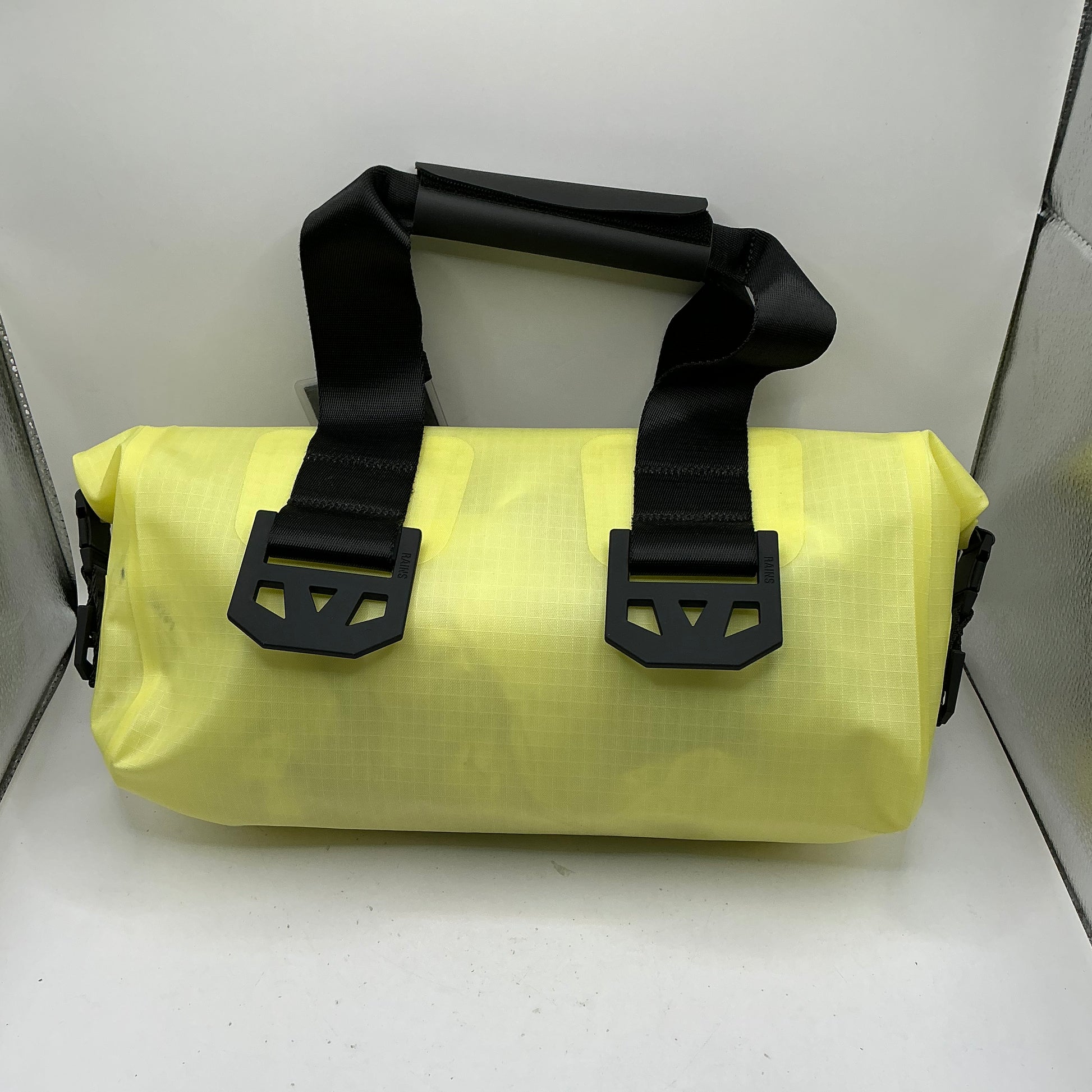 Rains, waterproof roll top bag, some slight marks