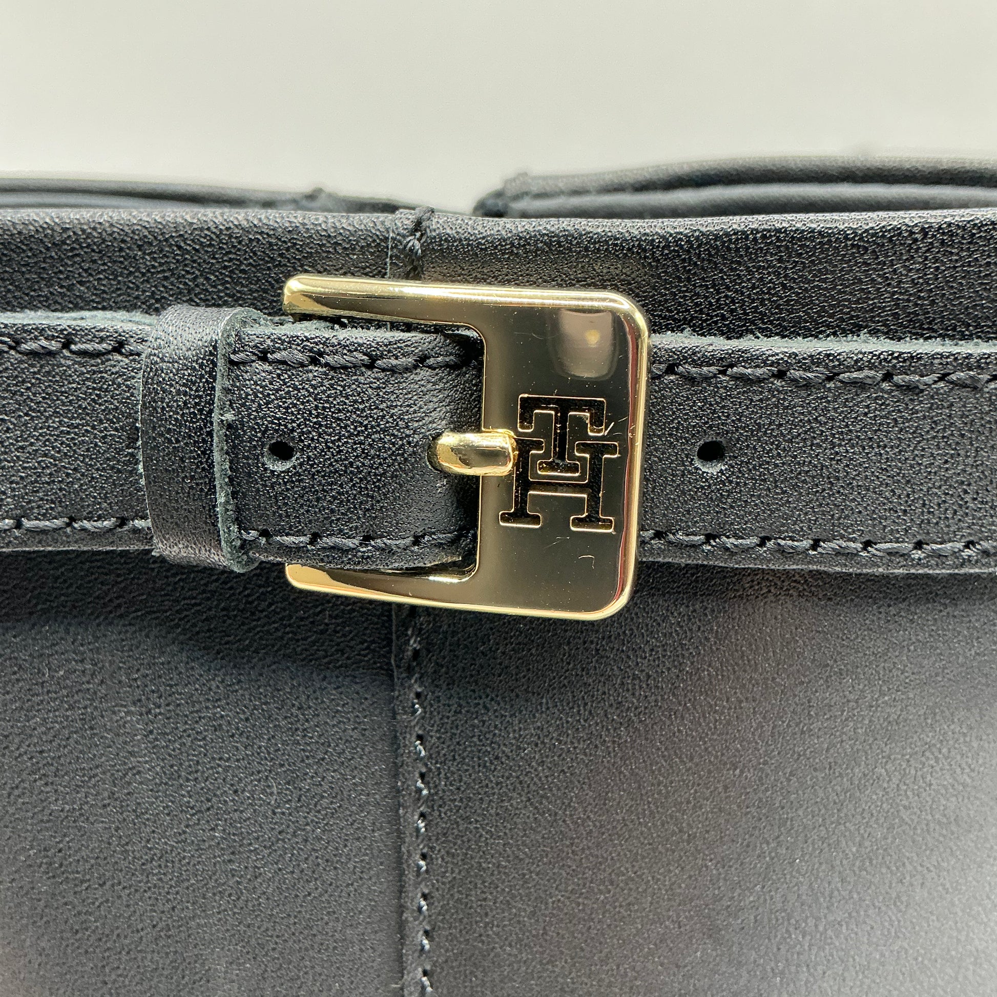 Tommy Hilfiger buckle riding mid heel boots